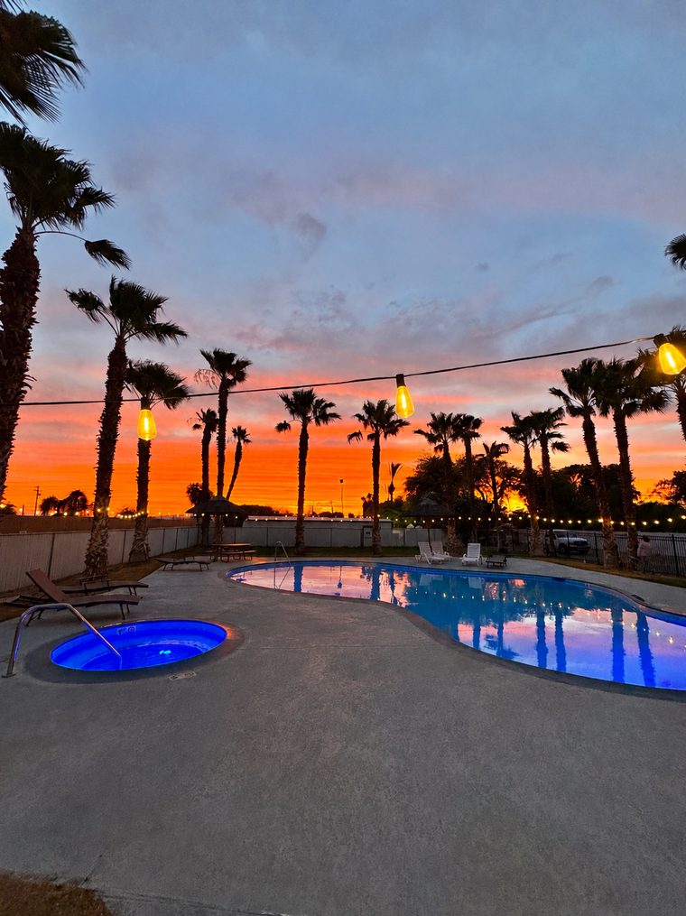 The pool and spa at sunset